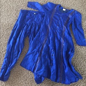 Long dress top with pants.