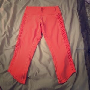 Bright orange lululemon crop