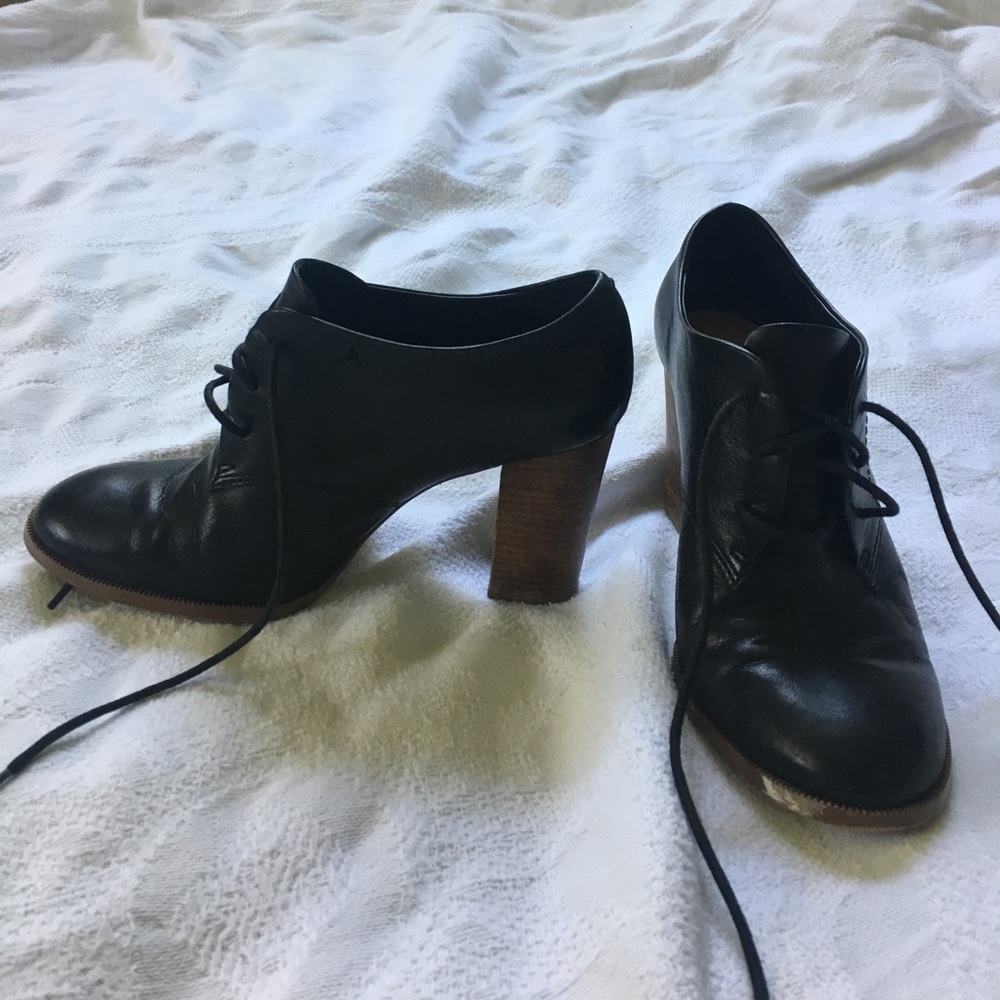 Black leather heeled booties