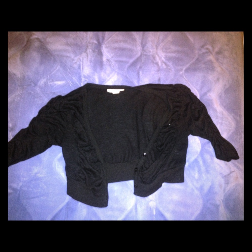 half length button up over shirt.