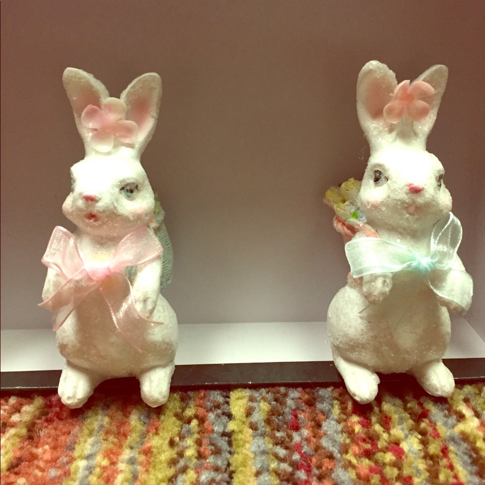 A matching set of figurine bunnies