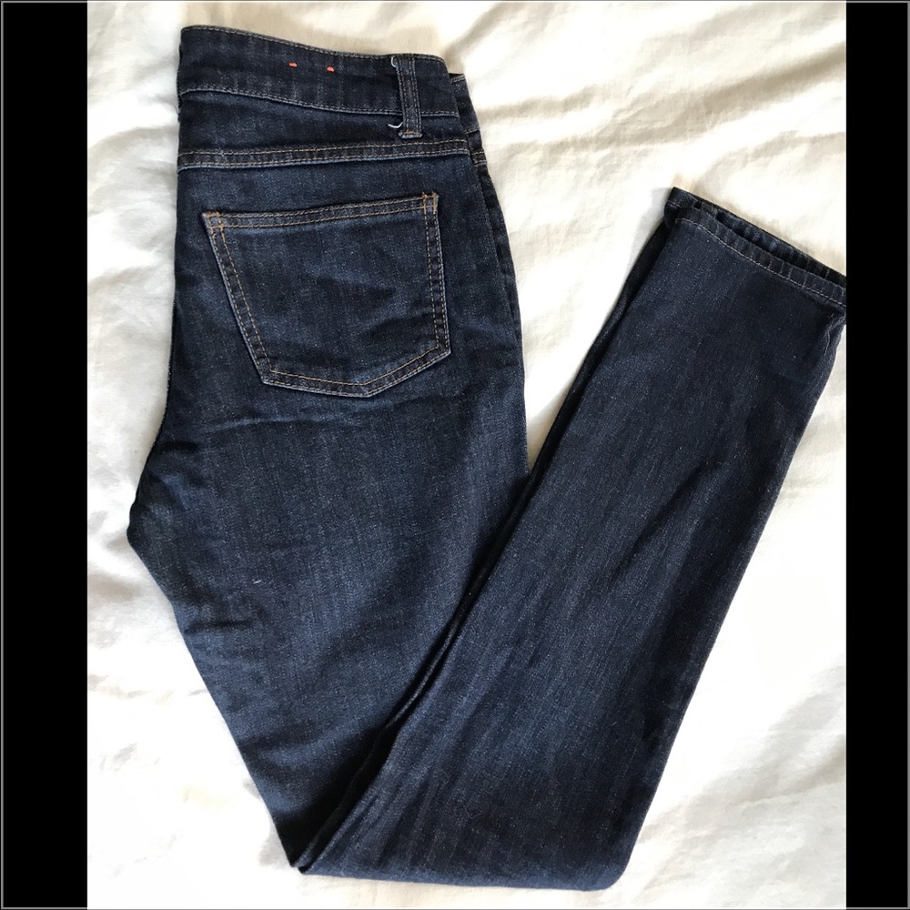 C. Wonder Skinny Mid Rise  Denim Jeans
