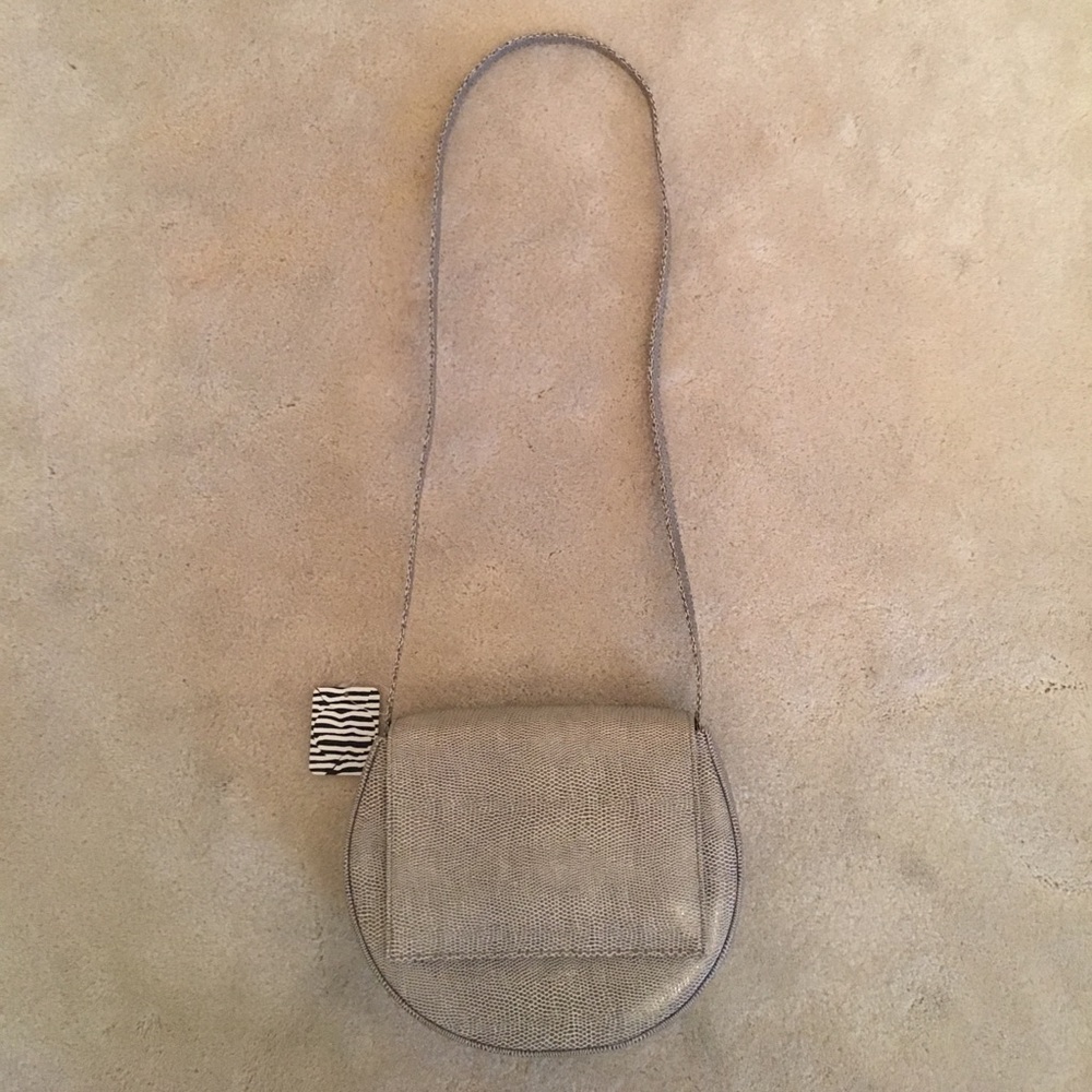 Cute circle shaped purse that is BRAND NEW from UO