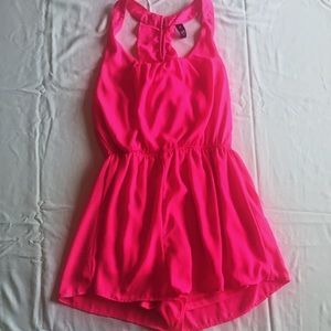 Bright pink romper with pretty detailed back