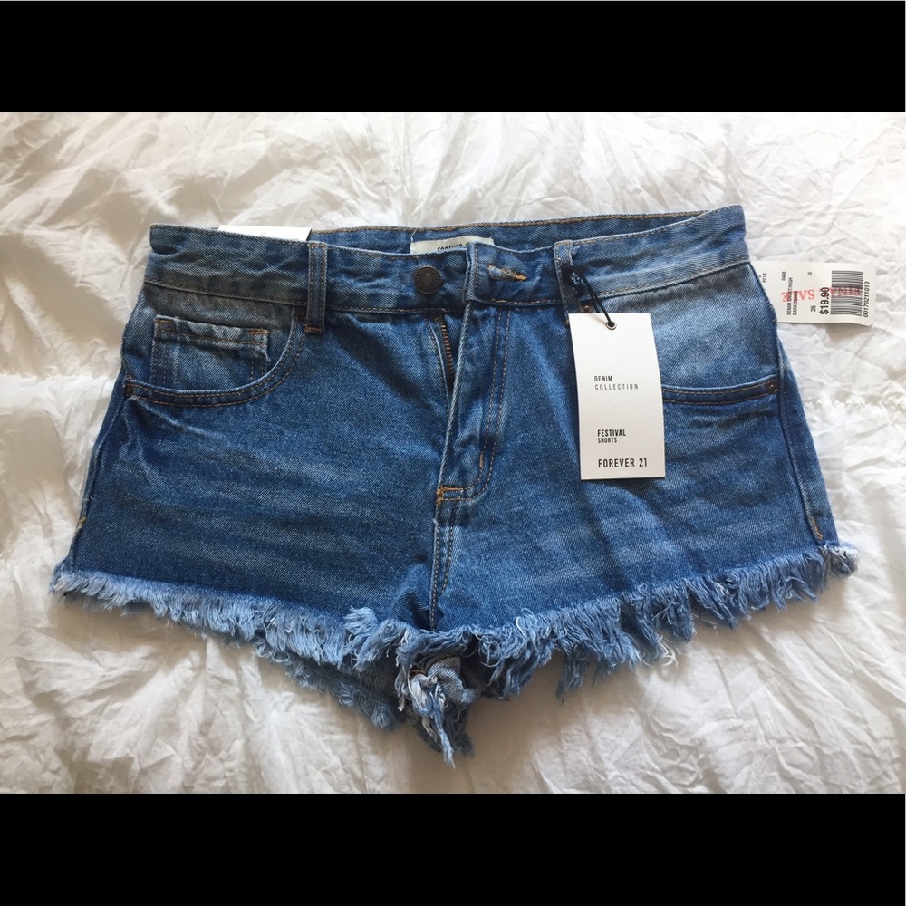 Size 26. High waisted denim shorts.