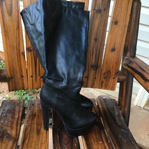 Black platform knee high boots