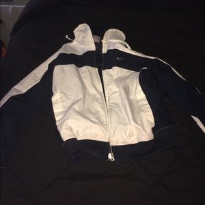 Navy and white Nike windbreaker