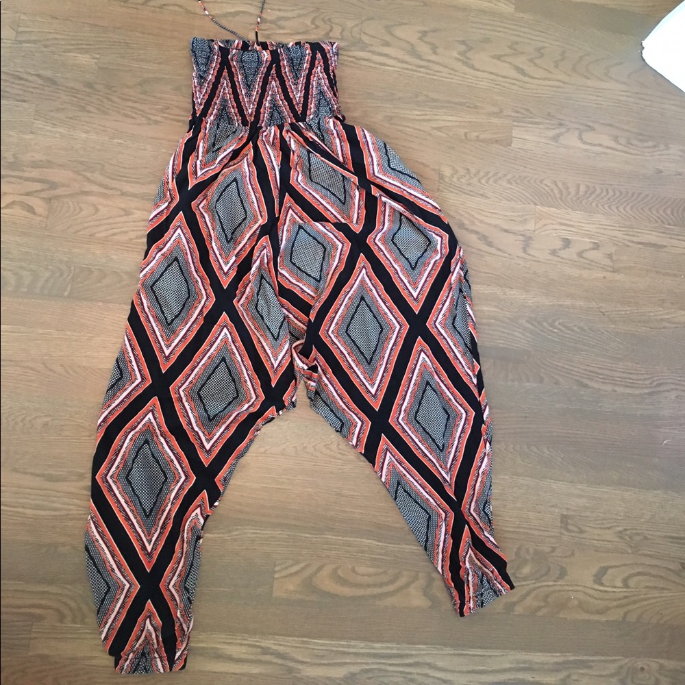 Anthropologie orange and black romper by Lilka XS