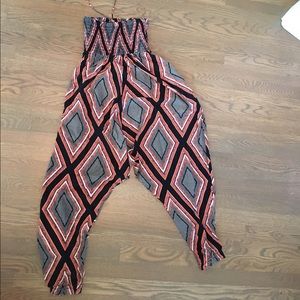 Anthropologie orange and black romper by Lilka XS