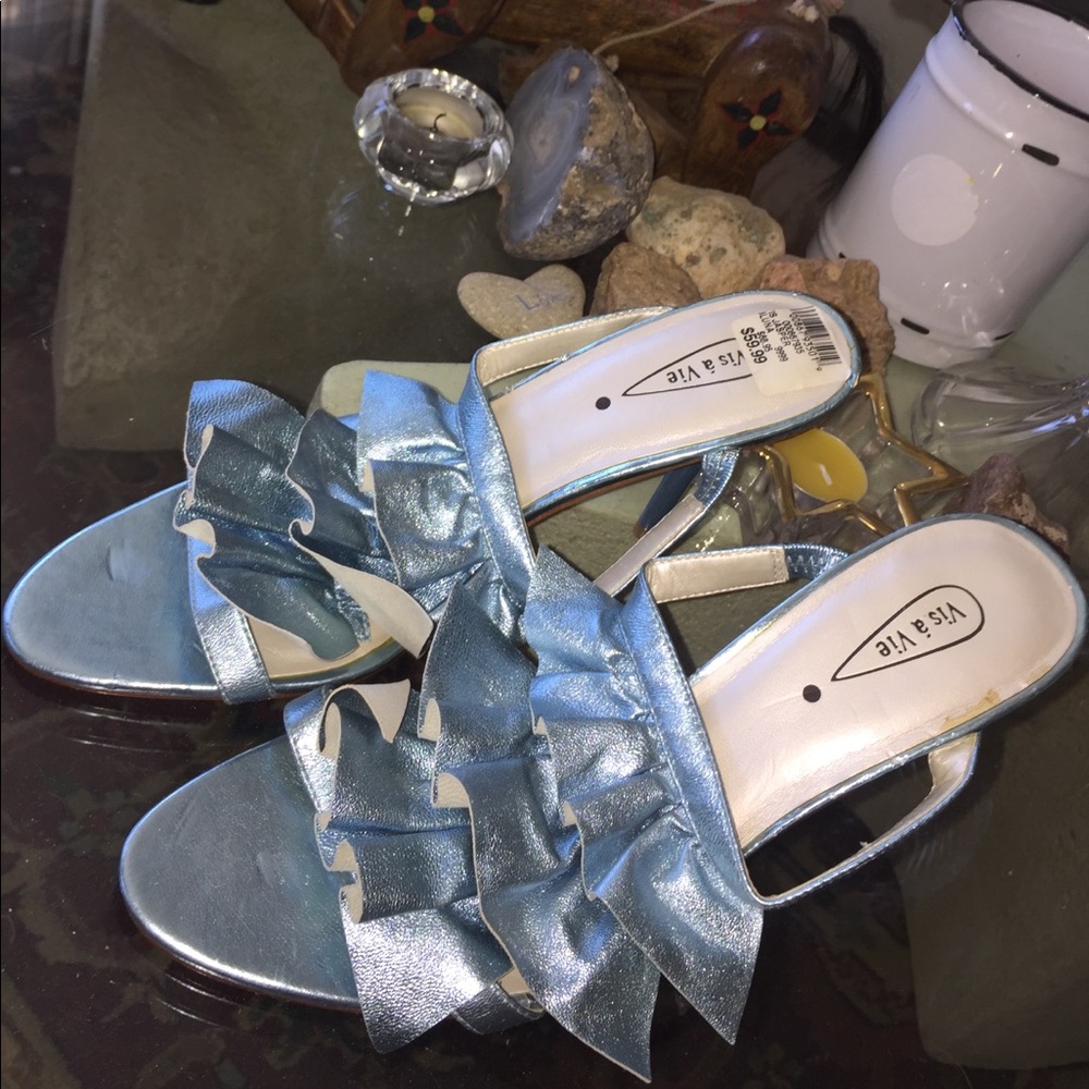 Brand new pair of blue leather ruffle heels