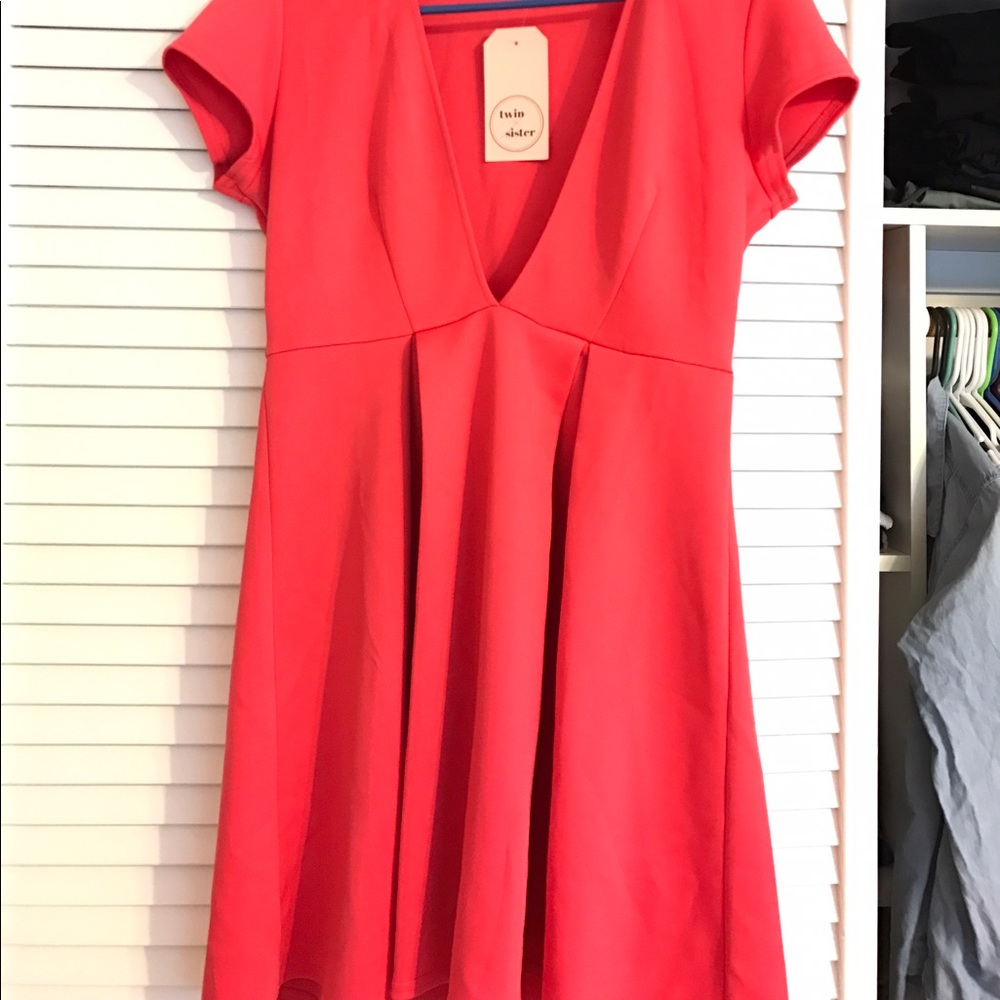 **NWT** fit and flare deep plung dress