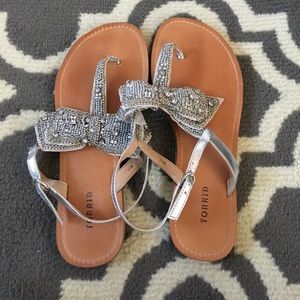Torrid silver bow embellished strap sandals.