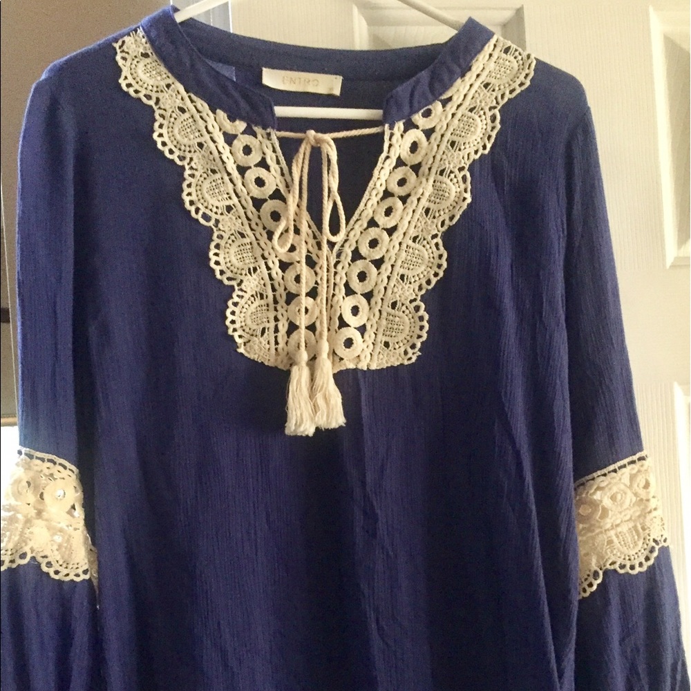 Blue & Ivory Top With A Unique Stitching Design