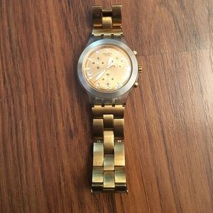 Women's gold swatch needs new battery untested