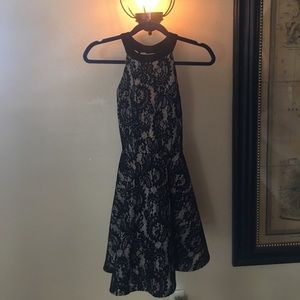 nude w black lace overlay halter dress