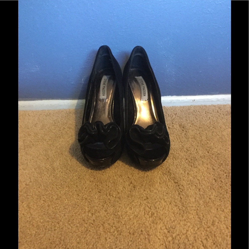 Black Steve Madden heels.