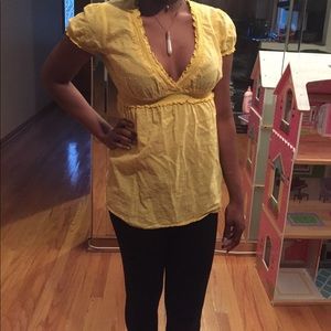 Yellow low cut blouse (it's a little wrinkled)