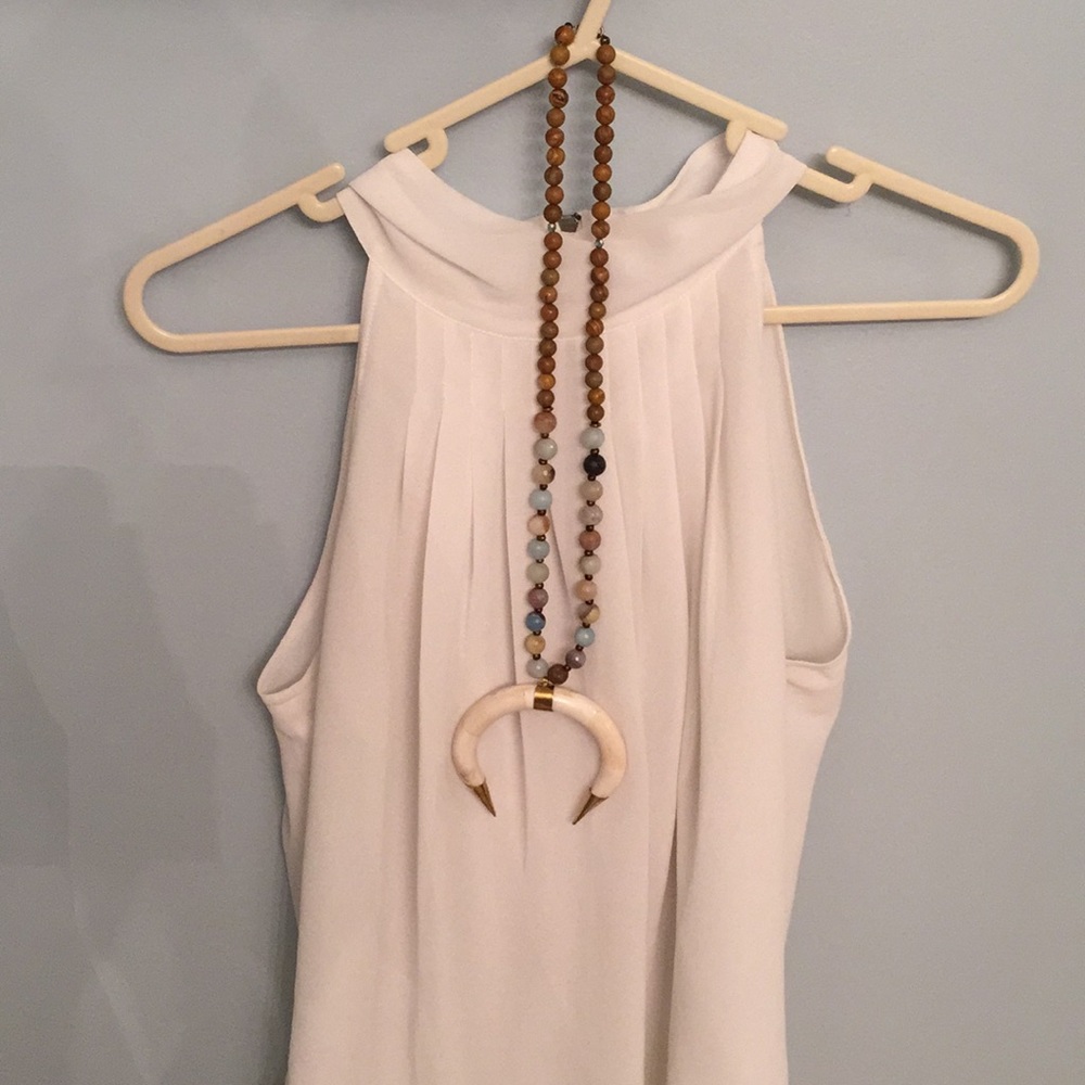 White collared sleeveless blouse