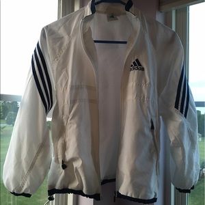 Small adidas rain coat. No stains. Looks new
