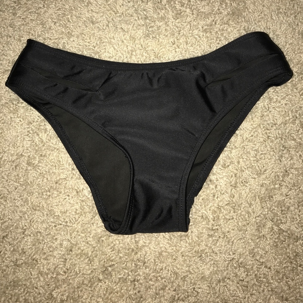 Black bathing suit bottoms. Never worn!