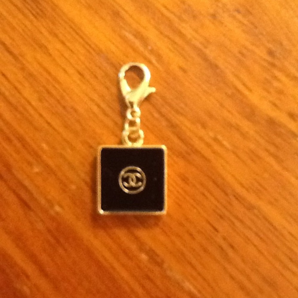 Jewelry.  Chanel enamel & gold charm