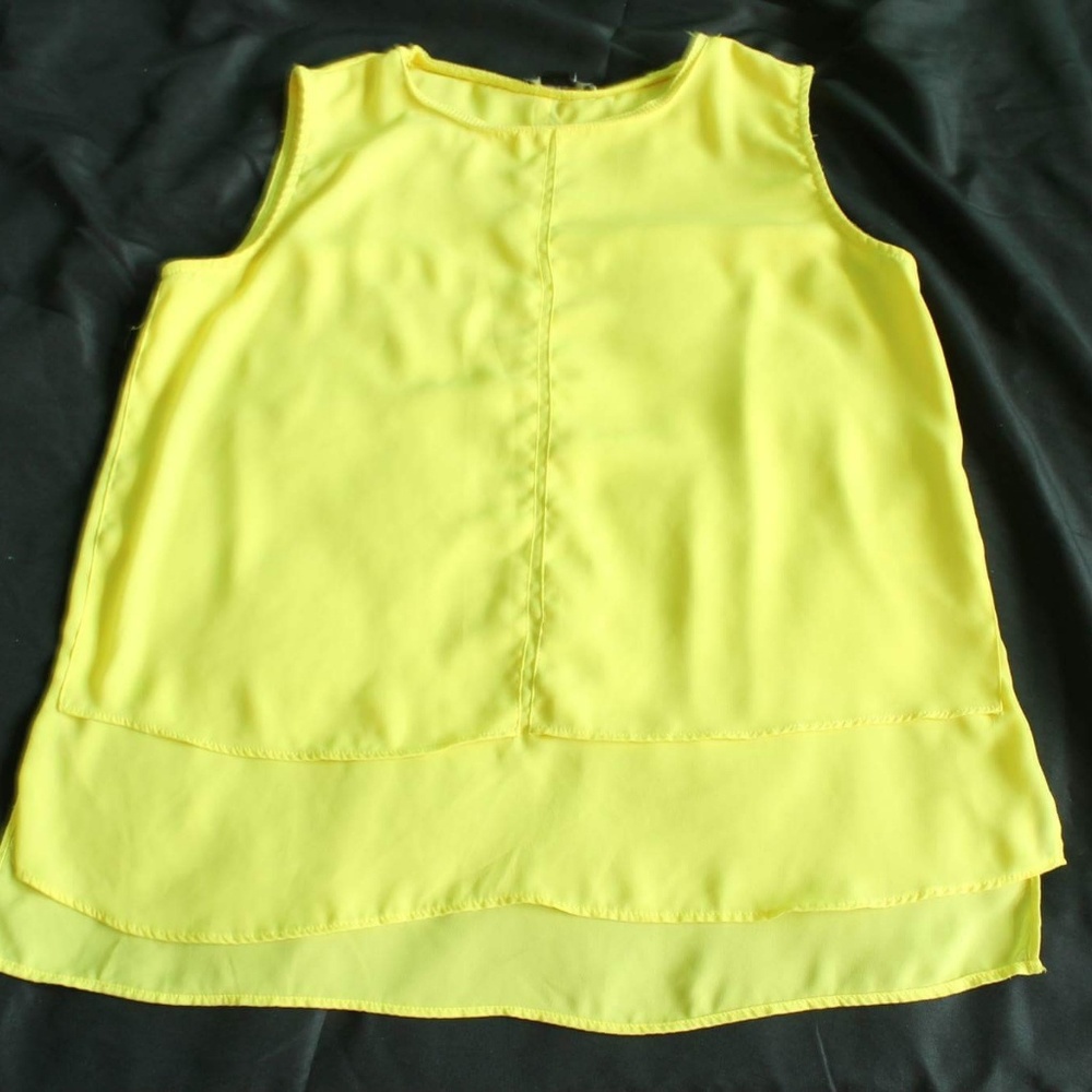 Yellow casual shirt.