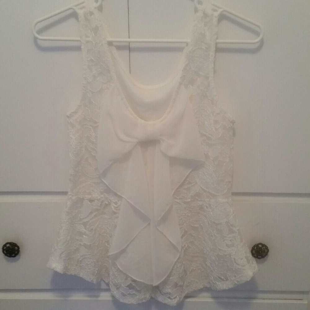 White embroidered peplum top