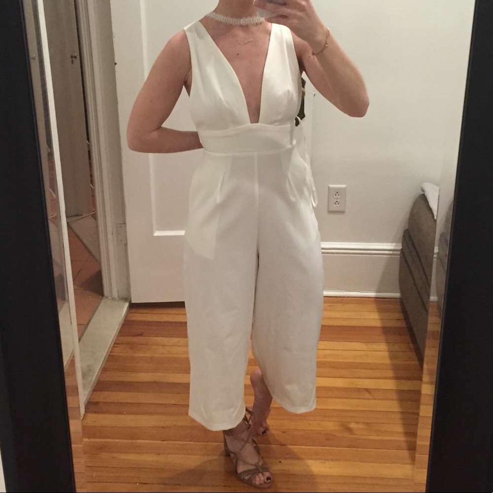 White pants romper