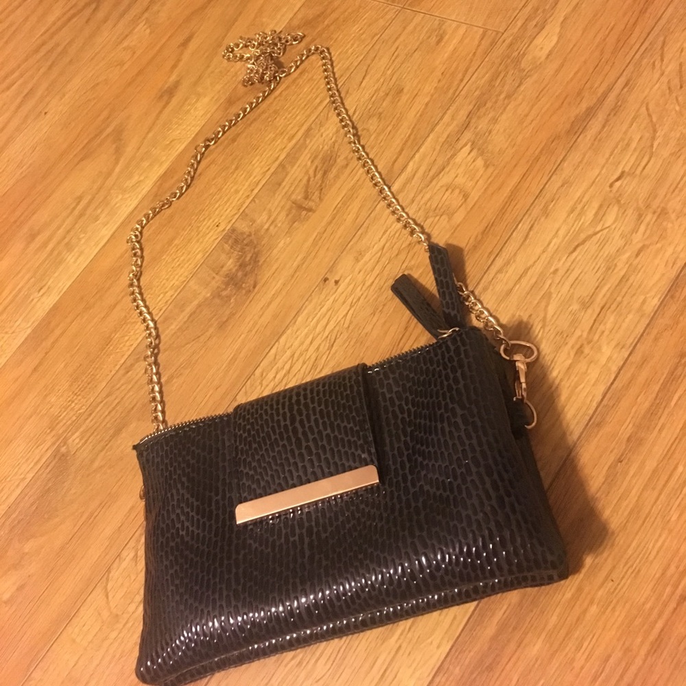 Black snakeskin cross body with gold chain
