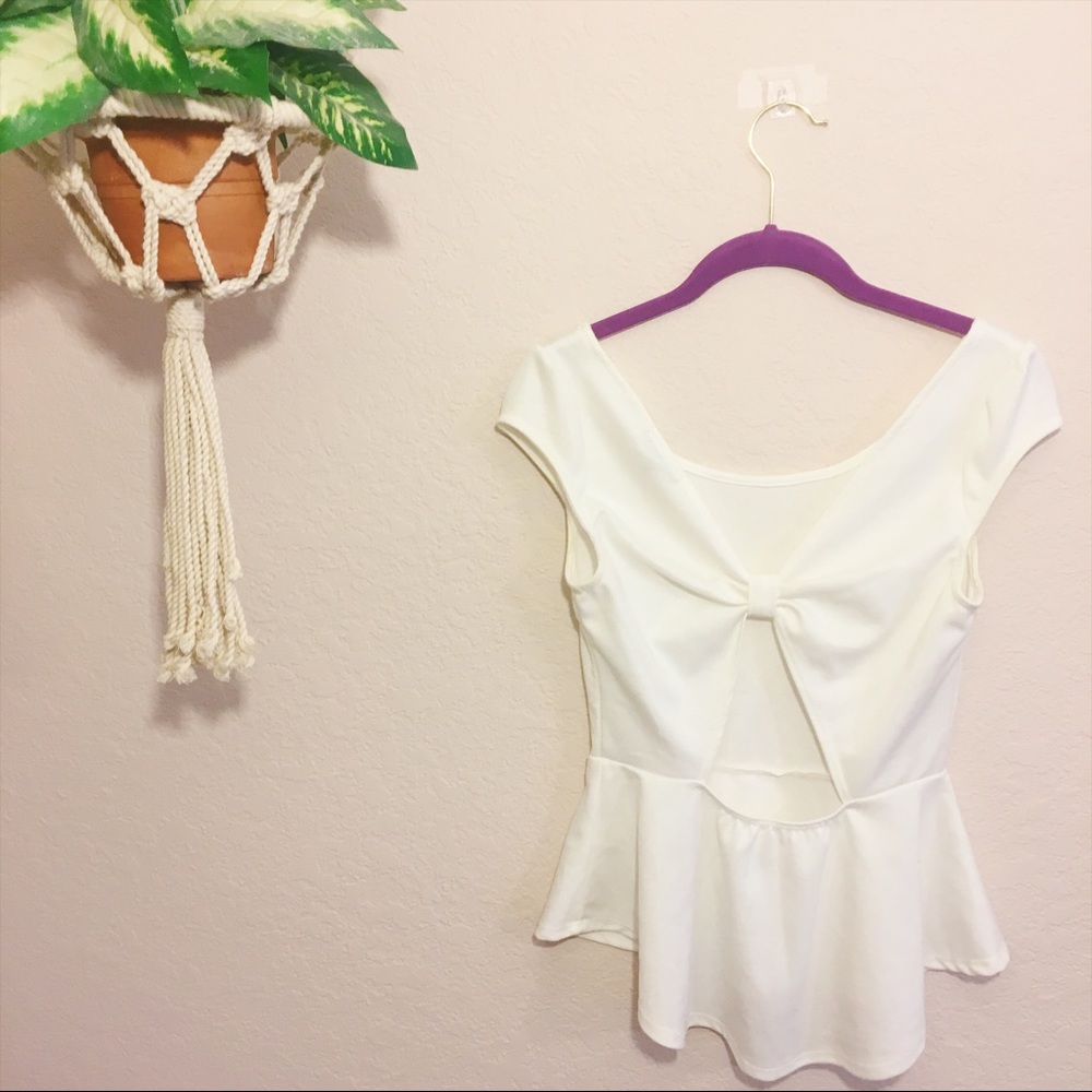 Peplum top with pearls and open back