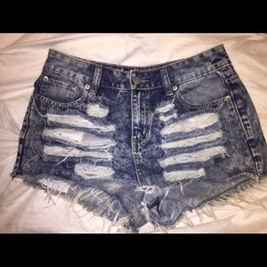 Denim distressed cutoffs