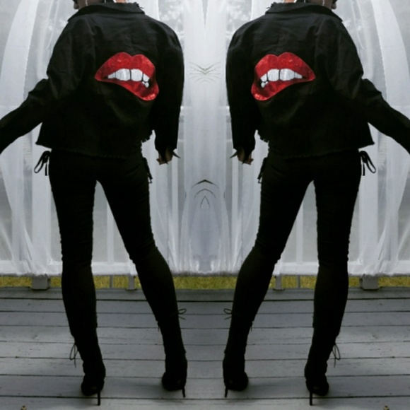 jean jacket with lips on the back