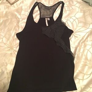 Black sleeveless top with fun bow