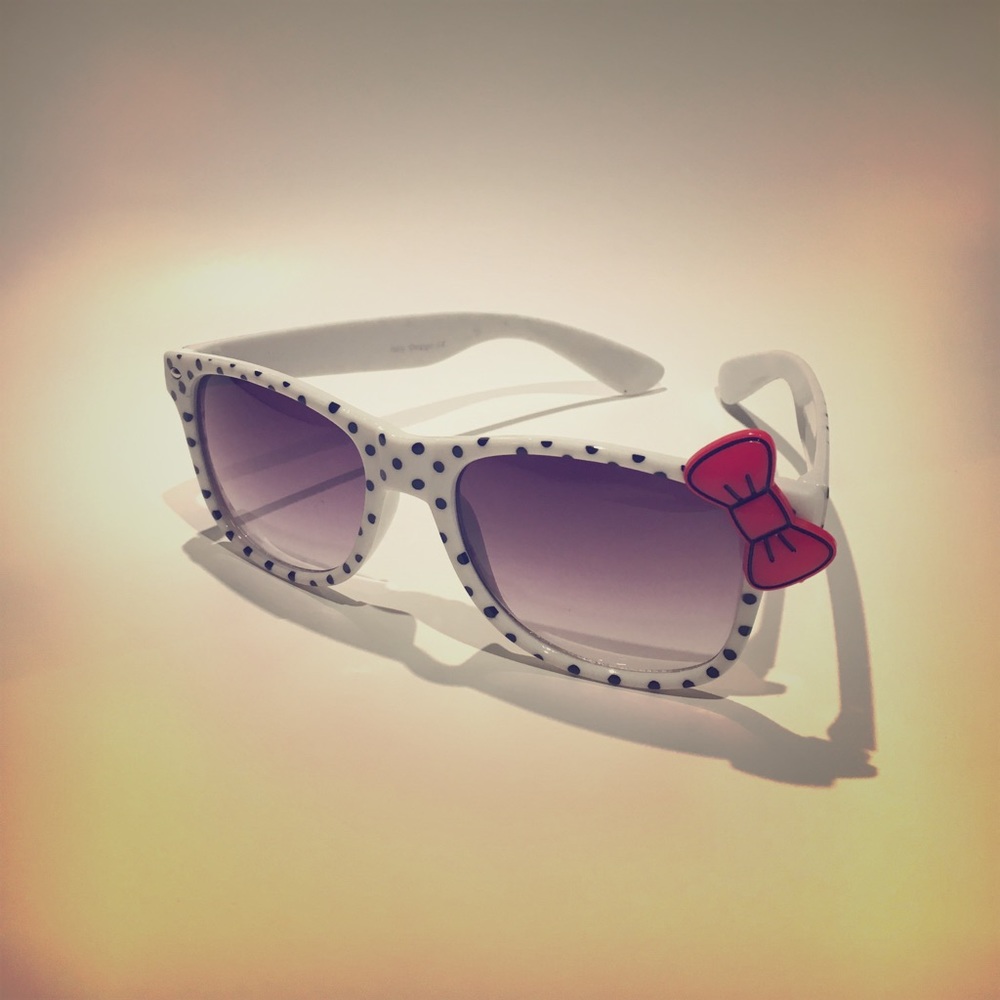 White polka dot red bow wayfarers