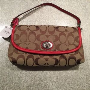 Coach 51820  khaki/vermillion wristlet