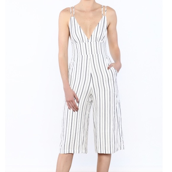 white sleeveless pantsuit