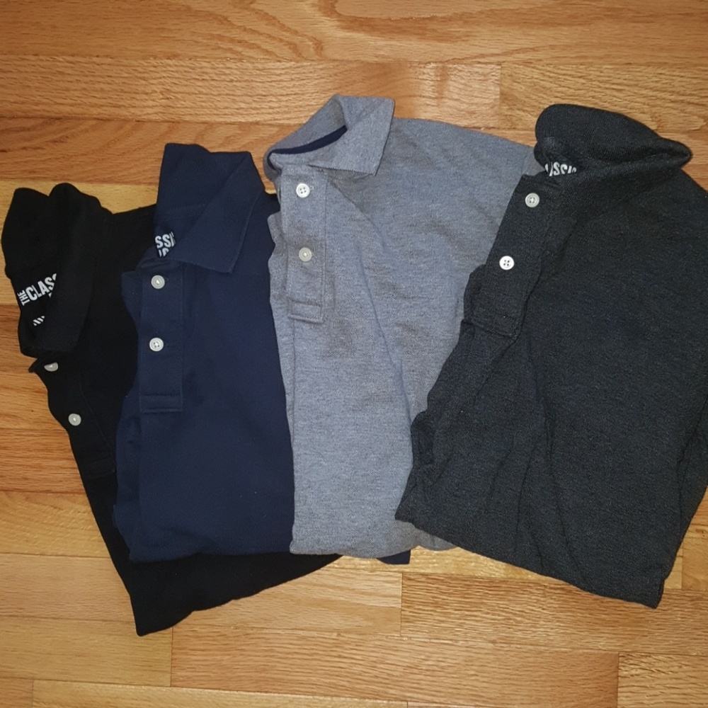 Bundle of four men's polo shirts