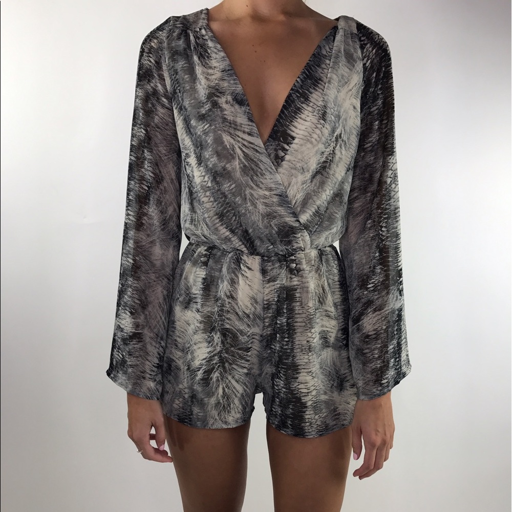 Brand new romper from revolve. Size XS