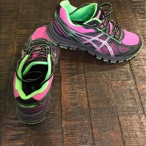 Asics tennis shoes.  Size 10