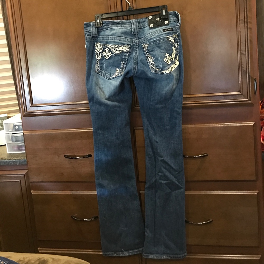 Miss Me bootcut slightly distress jeans.