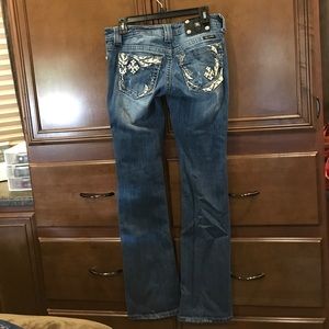 Miss Me bootcut slightly distress jeans.
