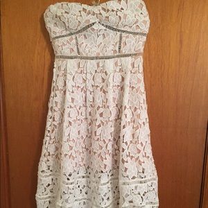 White lace dress with nude underlay