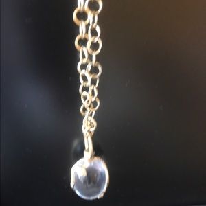 Pendent on gold tone chain