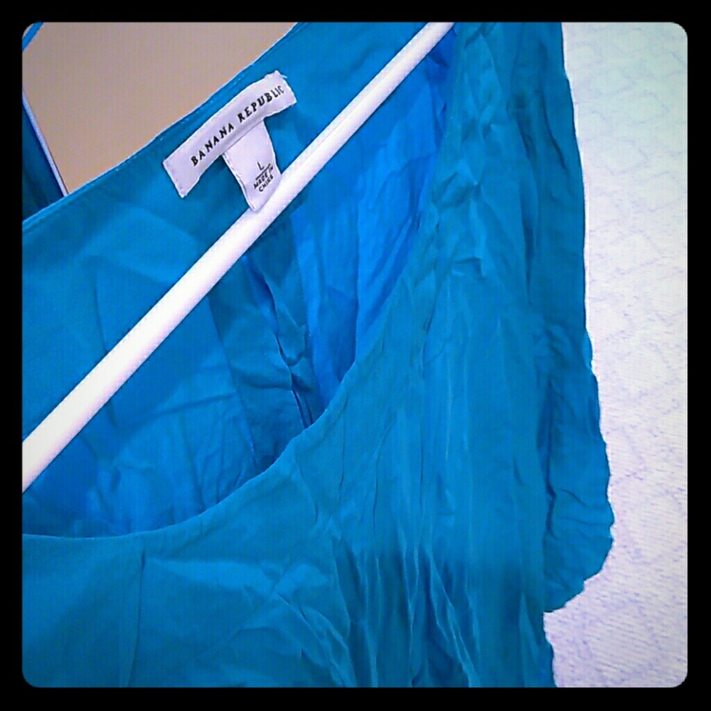 Aqua blue 100% silk blouse.