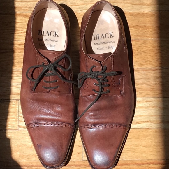 Perforated cap toe lace up shoes