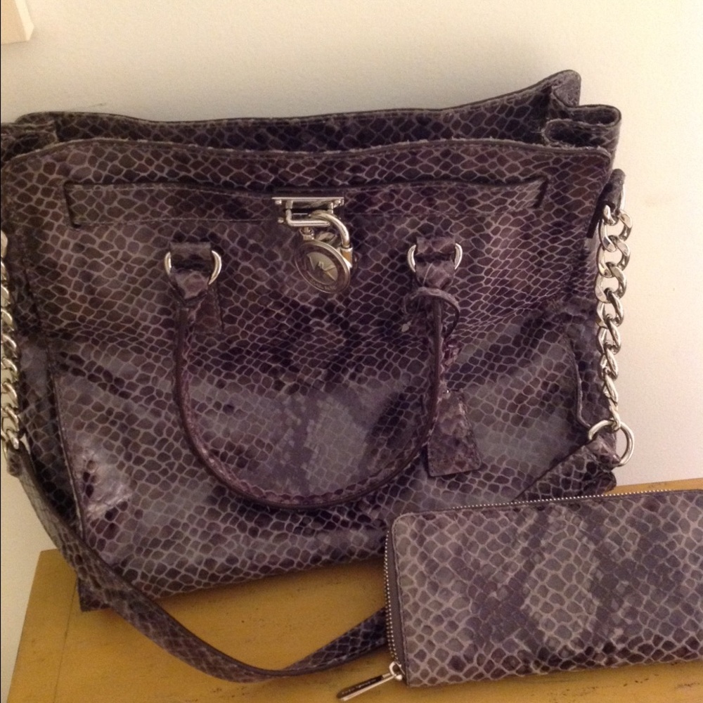 Michael Kors animal print bag and wallet. SOLD