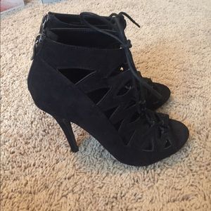 black lace up heels. size 6.5. 4.5 inch heel.