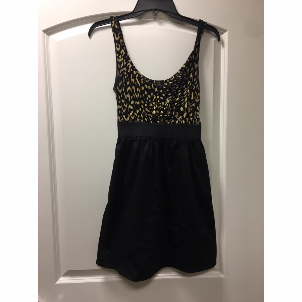 Black and gold Bebe dress