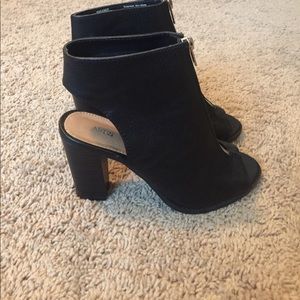 black block heel with zipper detail. size 6.