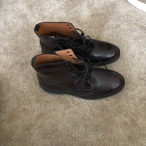 Burgundy patent leather brogue boots